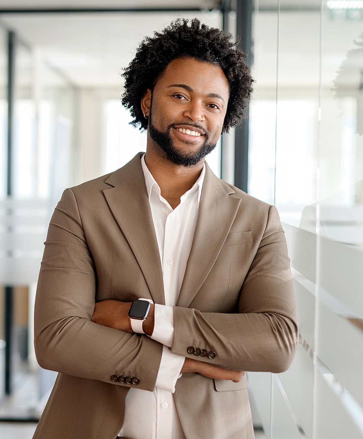 Smiling professional in a business setting.